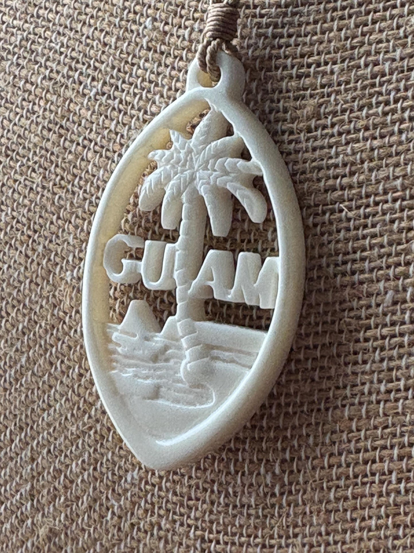 Hand Carved Bone Guam Sling Stone Seal Pendant and Necklace –  Guåhan and CHamoru Pride