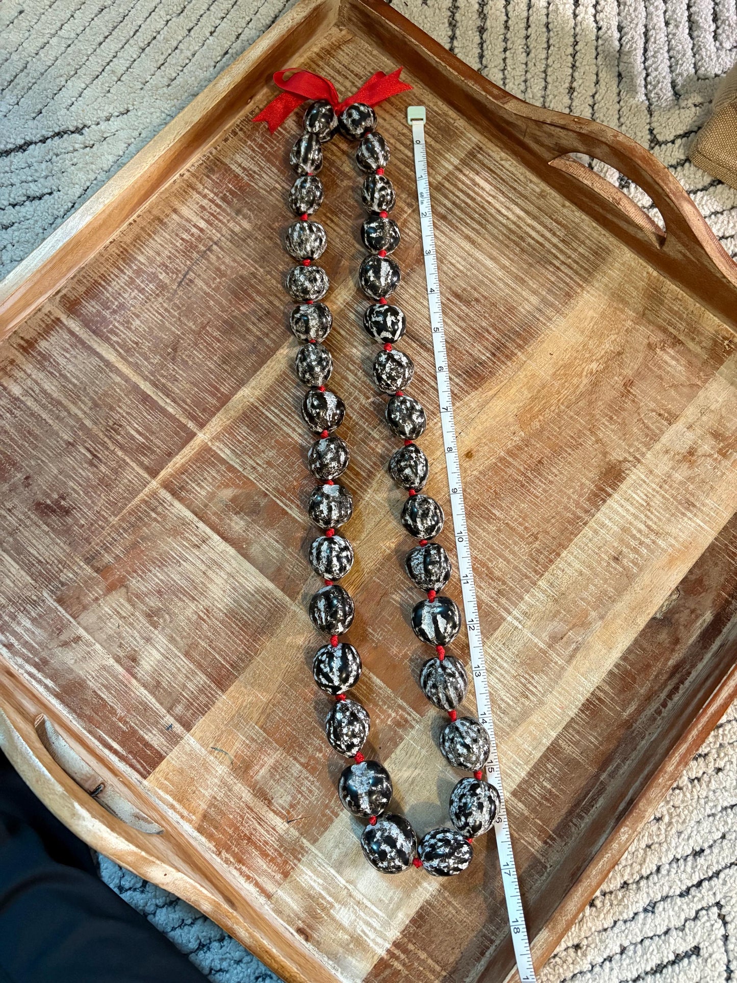 Authentic Kukui Nut Lei: 32" Black & White with Red Ribbon