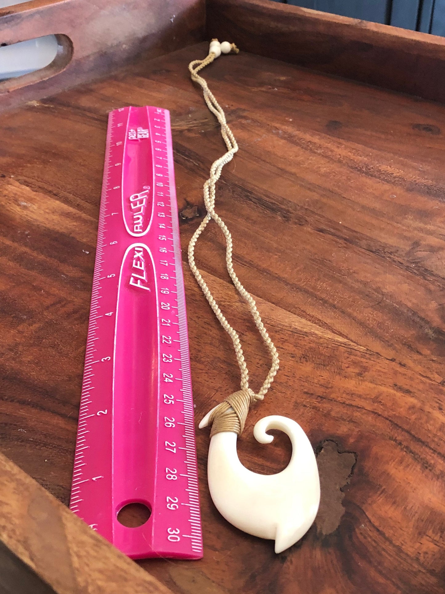 Unique Handsomely Polished Hand-Carved Buffalo Bone Hei Makau (Fish Hook) with Koru Tip
