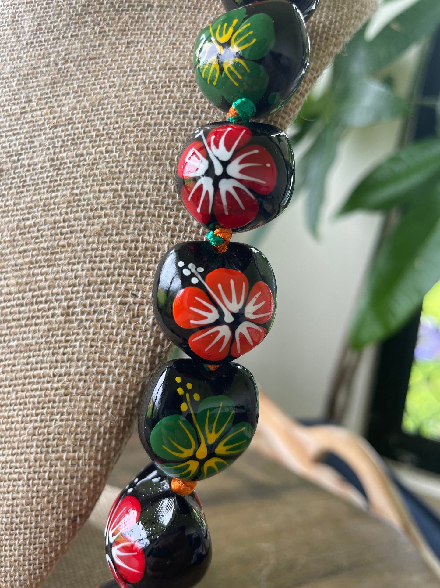 Hand Painted Kukui Nut Lei: Multi-Colored Hibiscus, Ribbon Tie