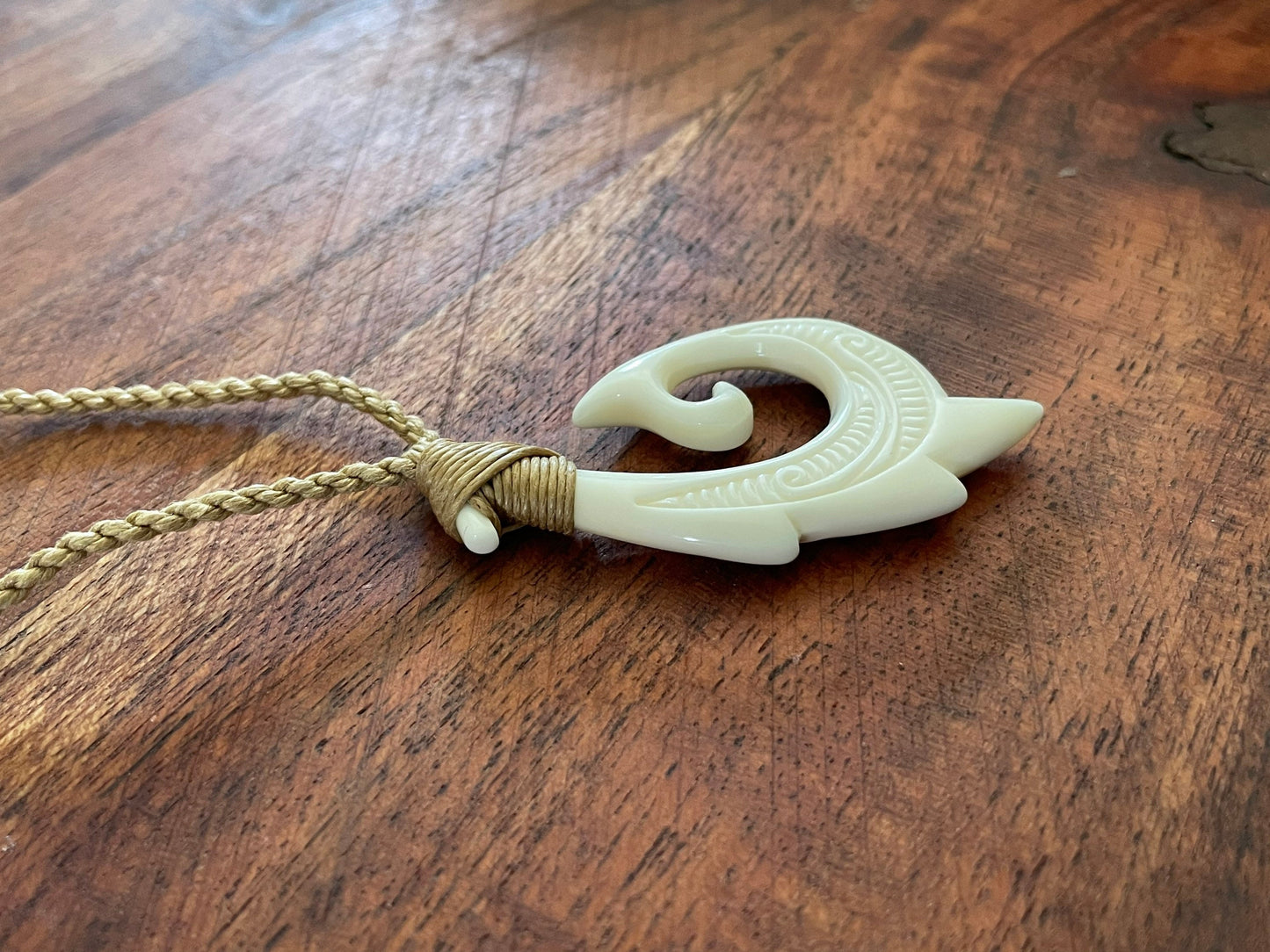 Uniquely Handcarved Solid Buffalo Bone Hei Makau Fish Hook with Koru