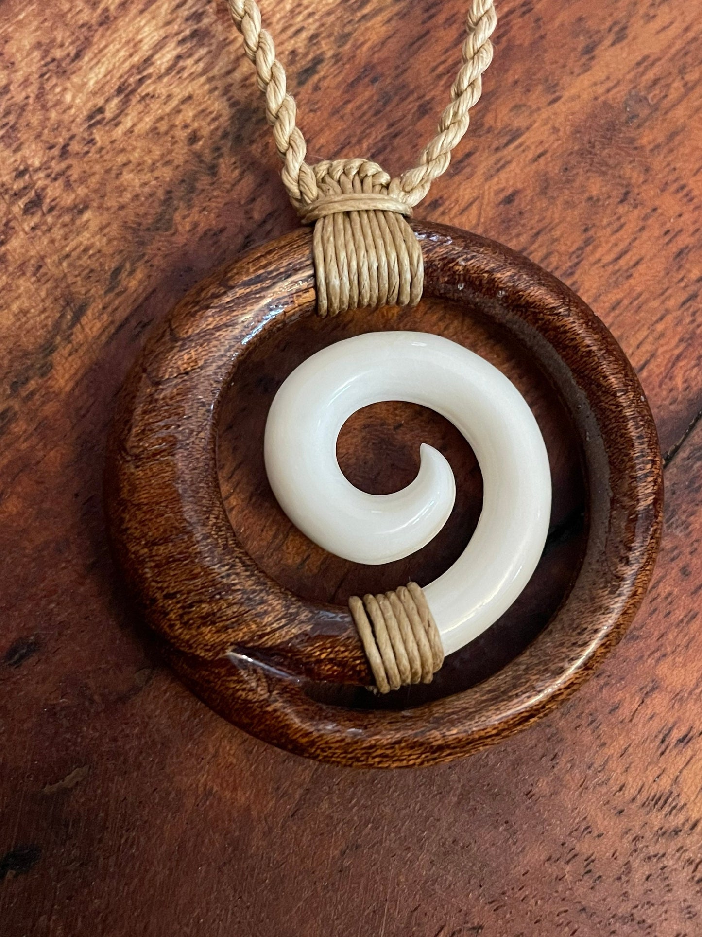 Solid Buffalo Bone and Koa Wood Adjustable Koru Necklace- Hawaiian Representation “Never Give-Up”