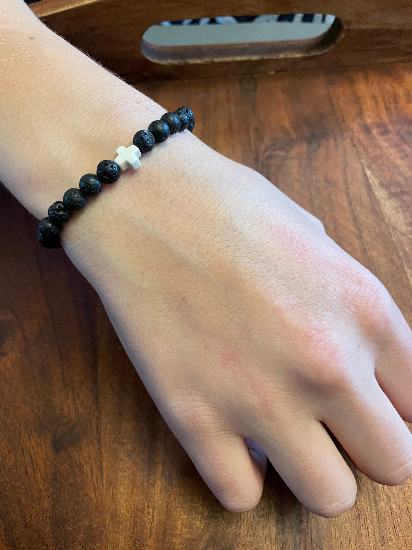 Petite 6mm Lava Bead Elastic Bracelet with Clay Cross Accent Bead