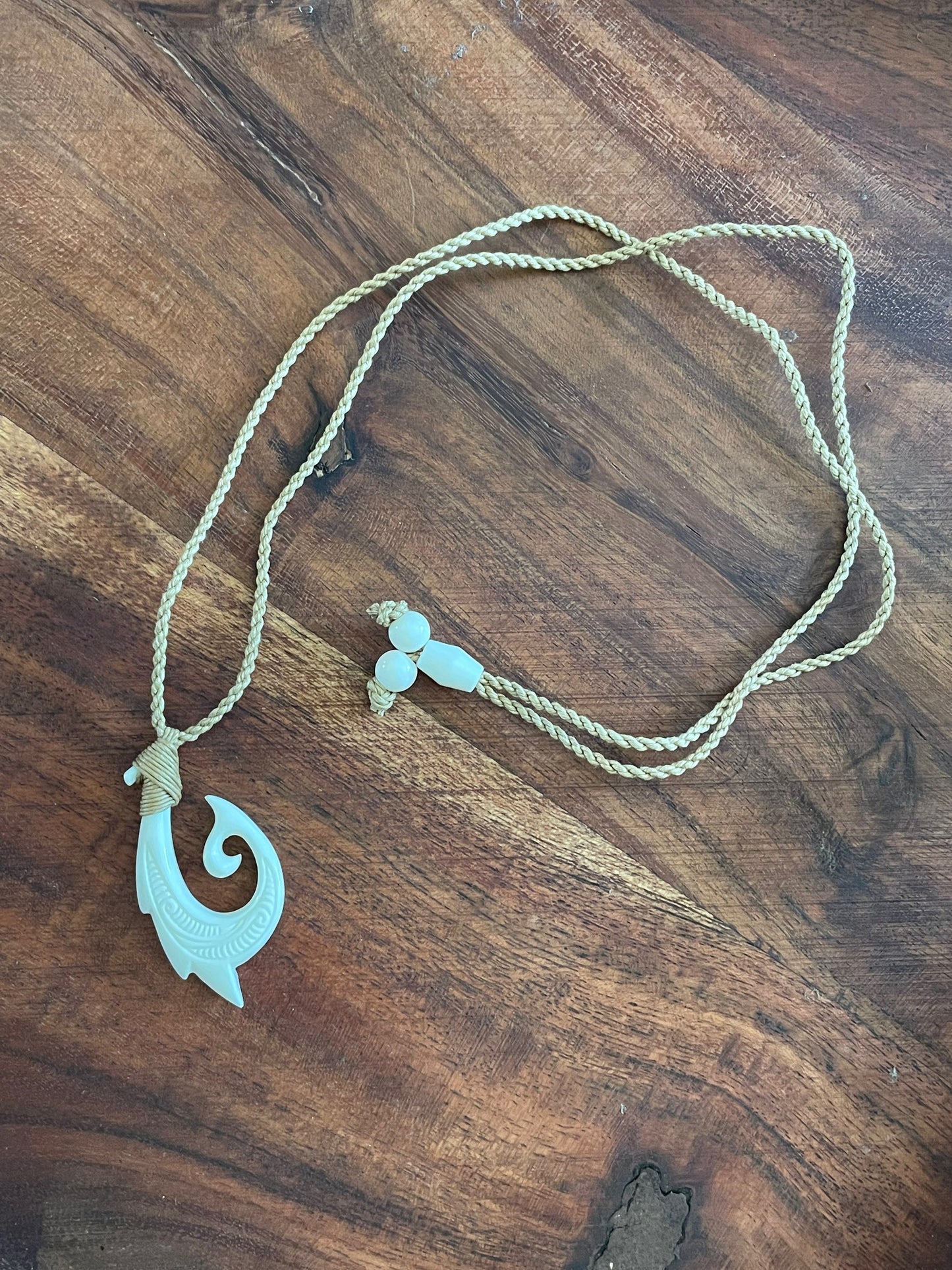 Uniquely Handcarved Solid Buffalo Bone Hei Makau Fish Hook with Koru