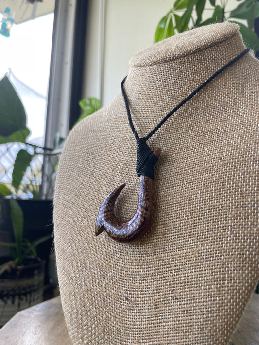 Handsomely Hand Carved Koa Wood Hawaiian Makau (Fish Hook) Necklace with Traditional Polynesian Designs. Adjustable Surfer Cord for Anyone
