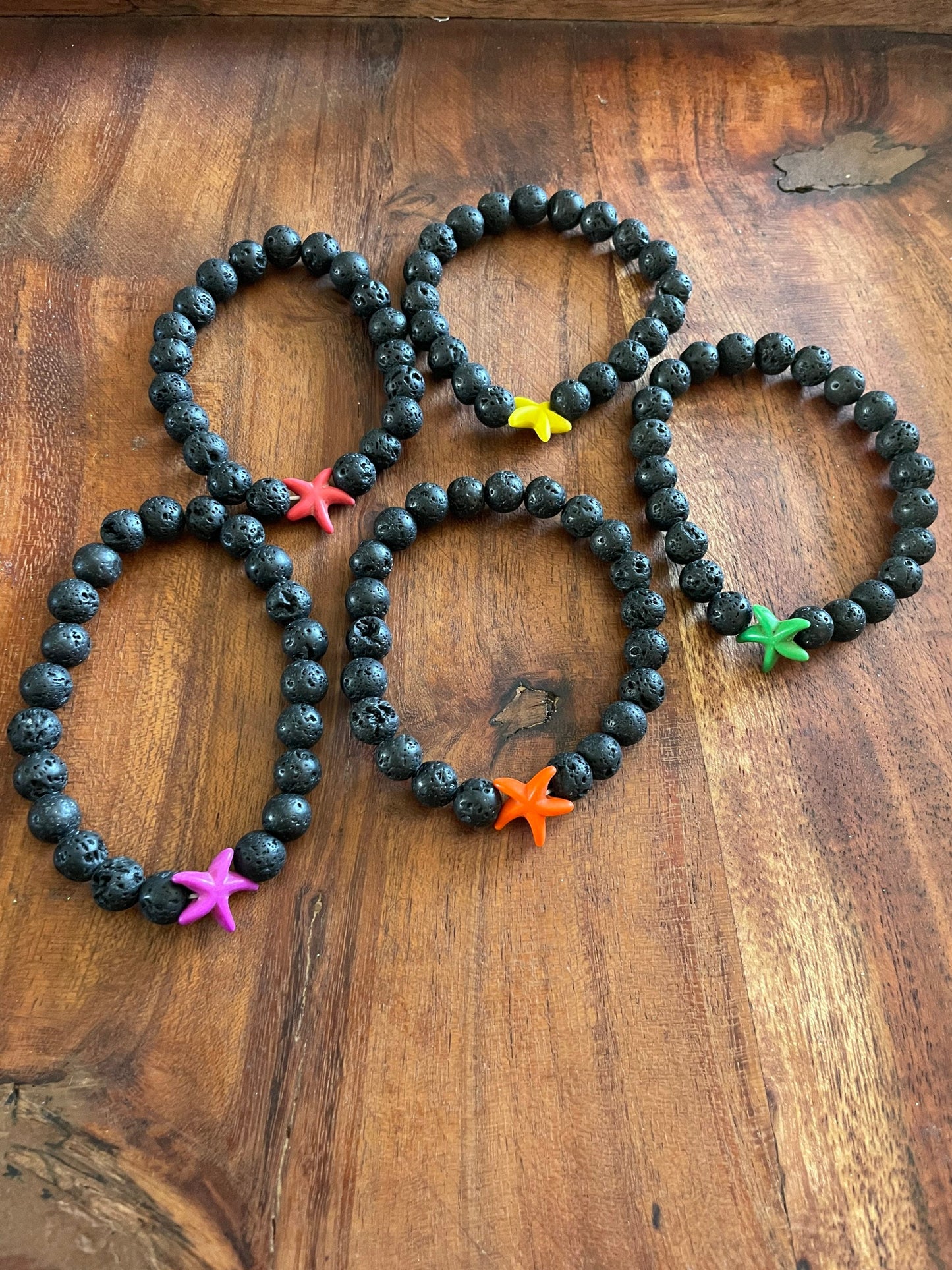 Authentic Lava Beaded Elastic Bracelet with a Starfish or  iʻa hōkū Clay Accent Bead