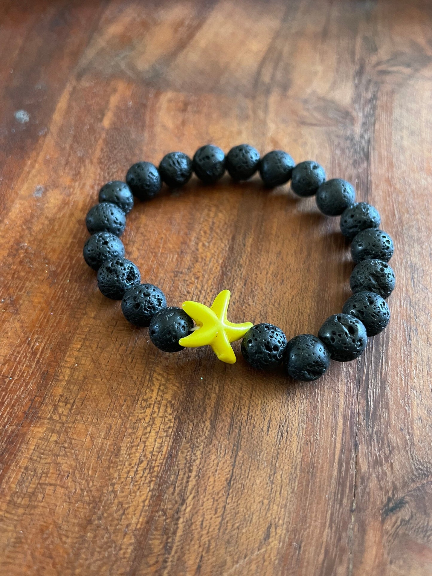 Authentic Lava Beaded Elastic Bracelet with a Starfish or  iʻa hōkū Clay Accent Bead