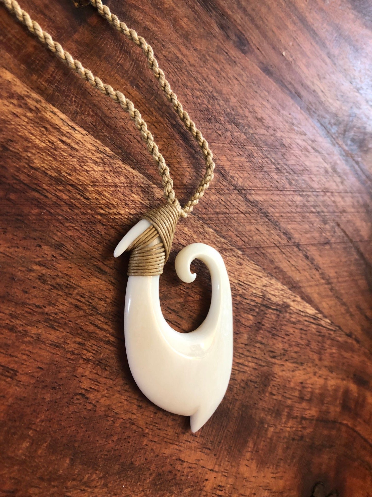 Unique Handsomely Polished Hand-Carved Buffalo Bone Hei Makau (Fish Hook) with Koru Tip