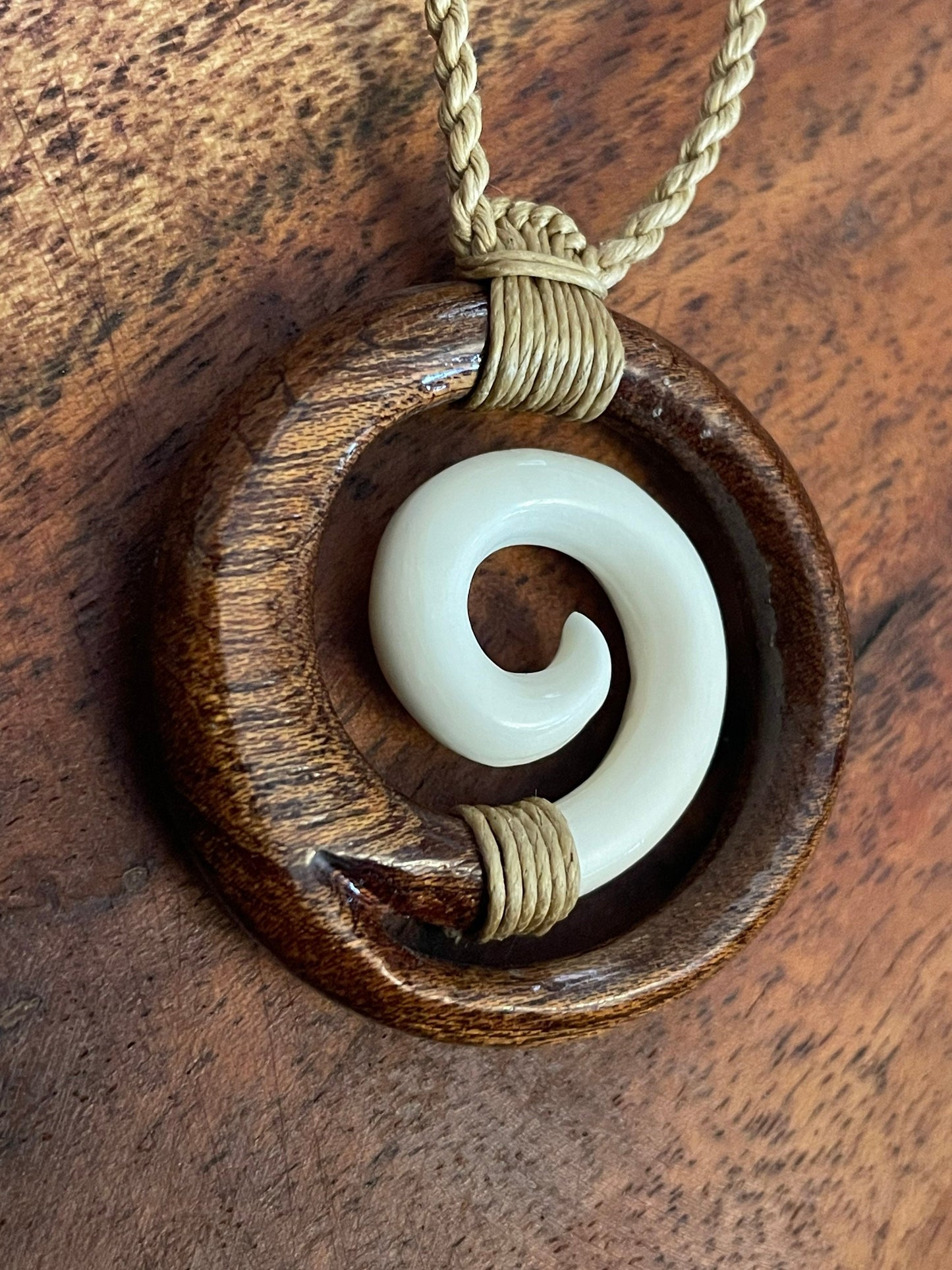 Solid Buffalo Bone and Koa Wood Adjustable Koru Necklace- Hawaiian Representation “Never Give-Up”