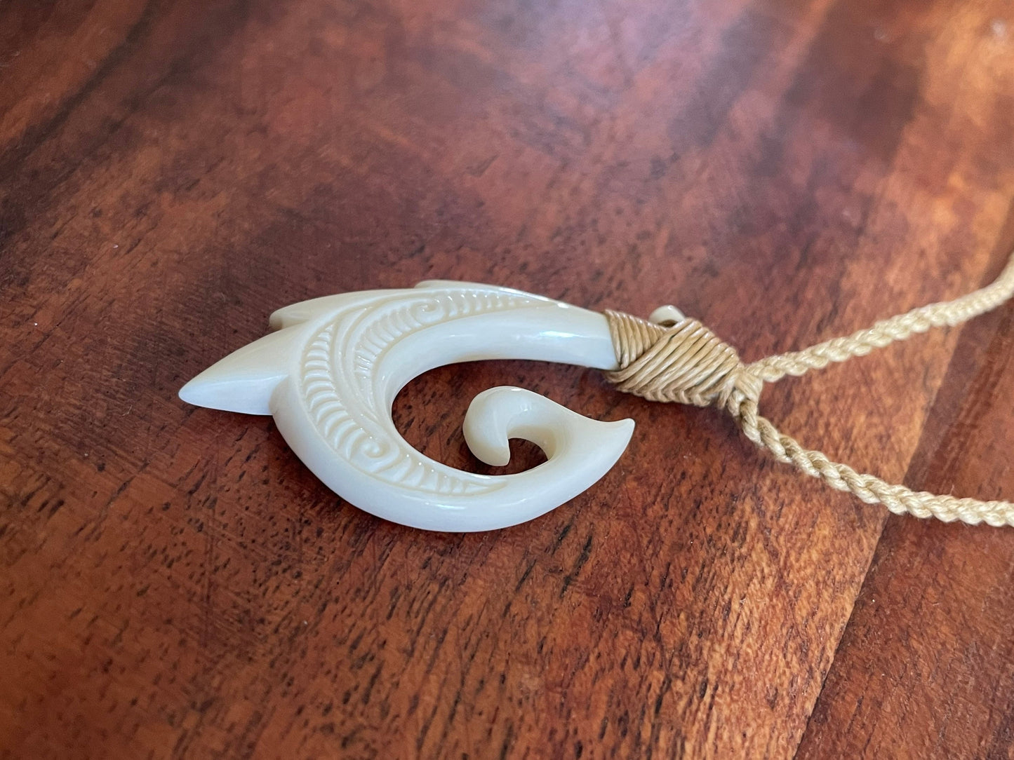 Uniquely Handcarved Solid Buffalo Bone Hei Makau Fish Hook with Koru