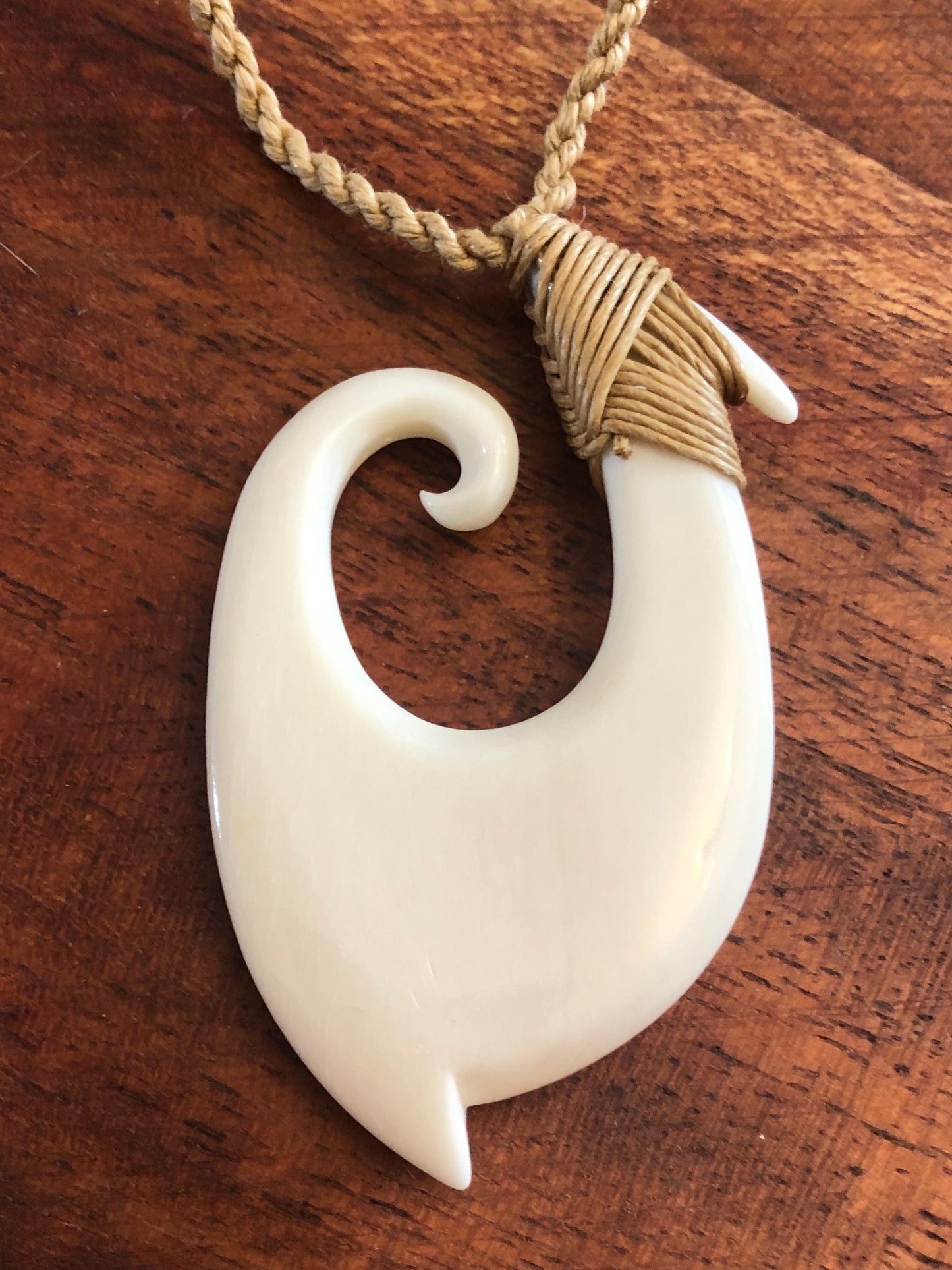 Unique Handsomely Polished Hand-Carved Buffalo Bone Hei Makau (Fish Hook) with Koru Tip