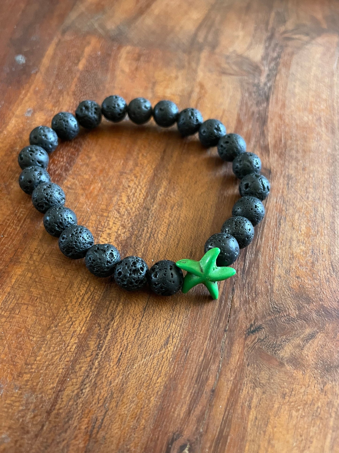 Authentic Lava Beaded Elastic Bracelet with a Starfish or  iʻa hōkū Clay Accent Bead
