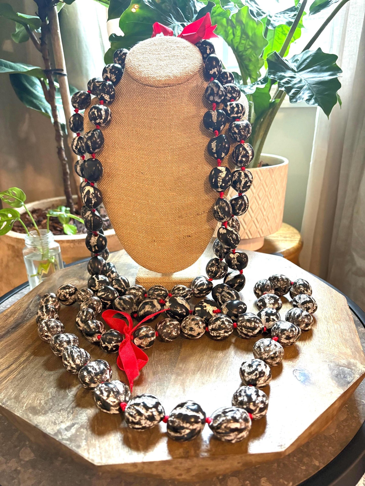 Authentic Kukui Nut Lei: 32" Black & White with Red Ribbon
