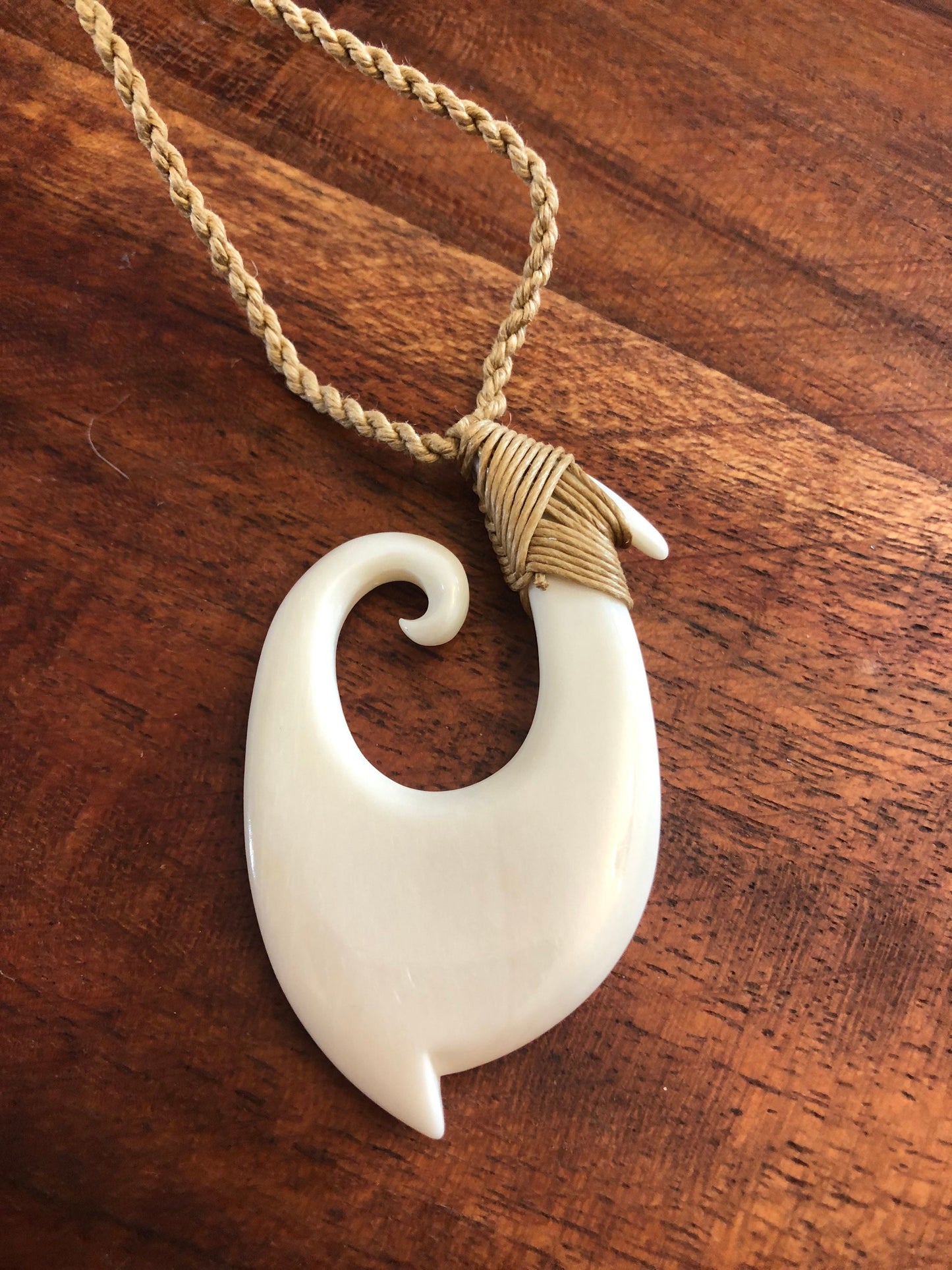 Unique Handsomely Polished Hand-Carved Buffalo Bone Hei Makau (Fish Hook) with Koru Tip