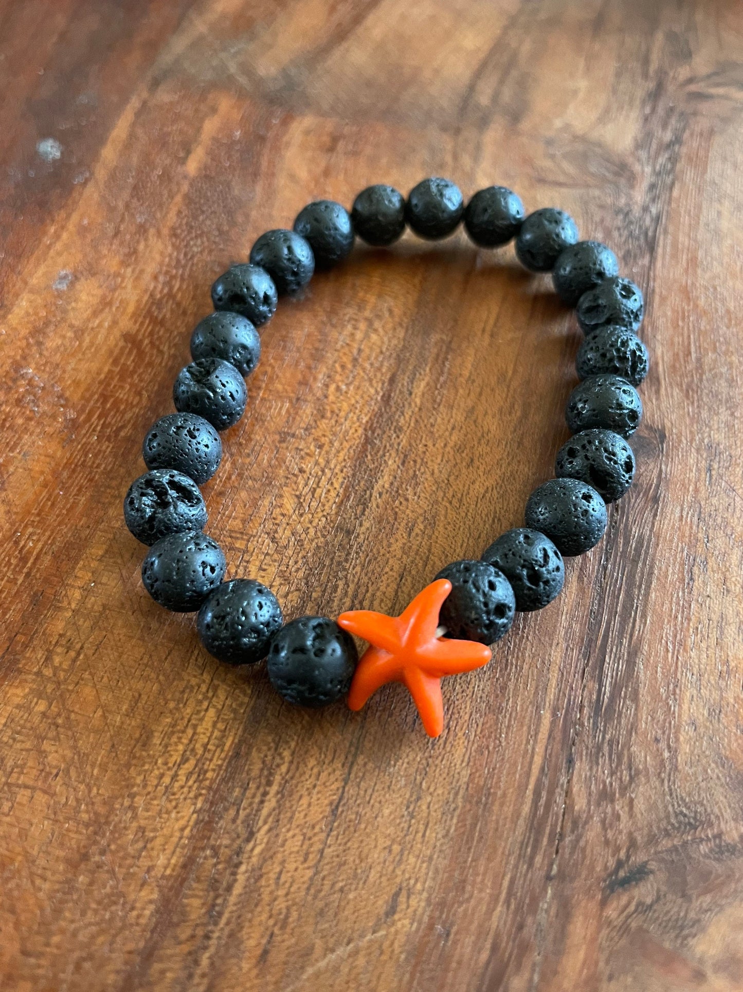 Authentic Lava Beaded Elastic Bracelet with a Starfish or  iʻa hōkū Clay Accent Bead