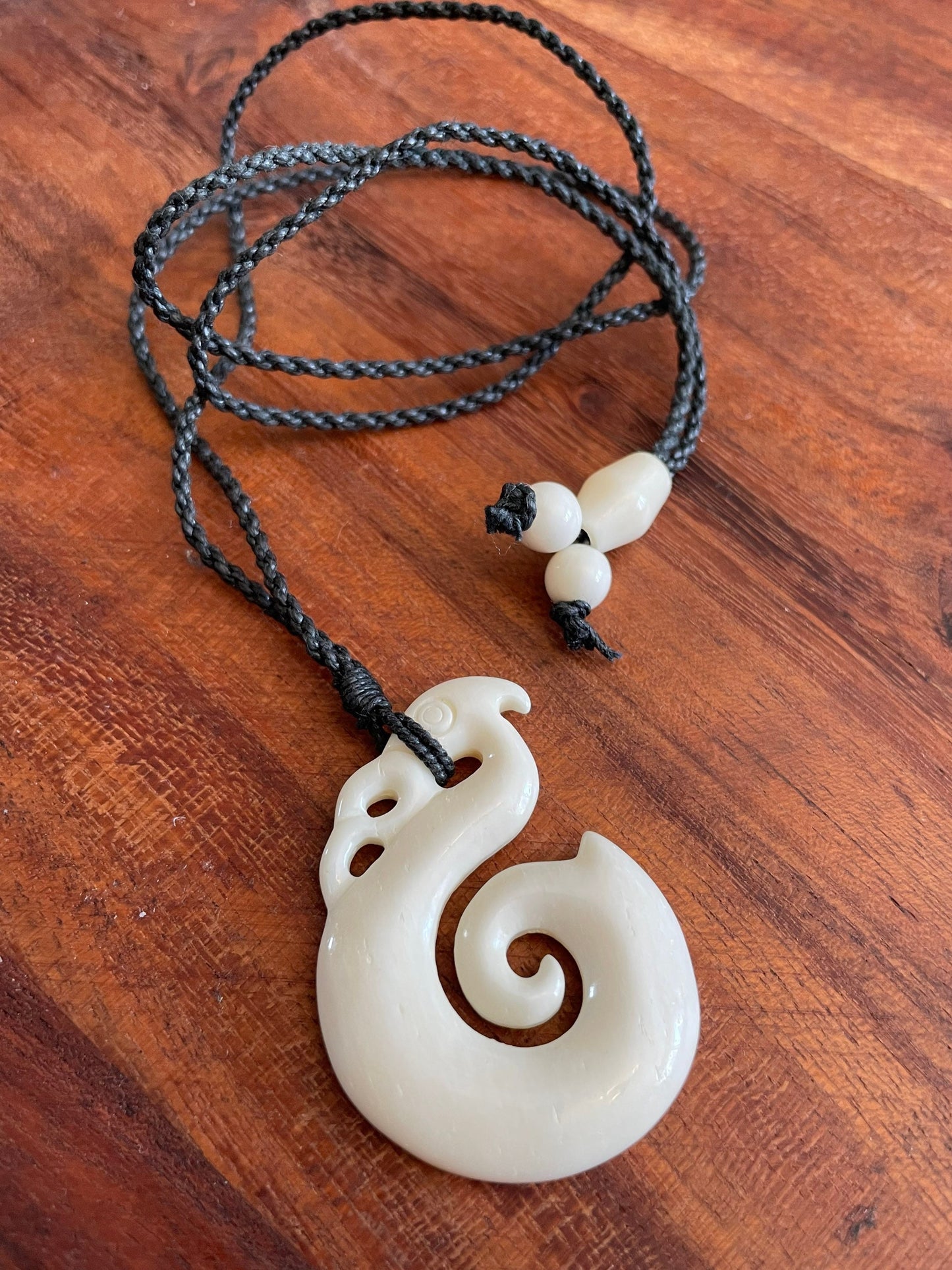 Hand Carved Buffalo Bone Fish Hook Necklace – Polynesian Makau Koru