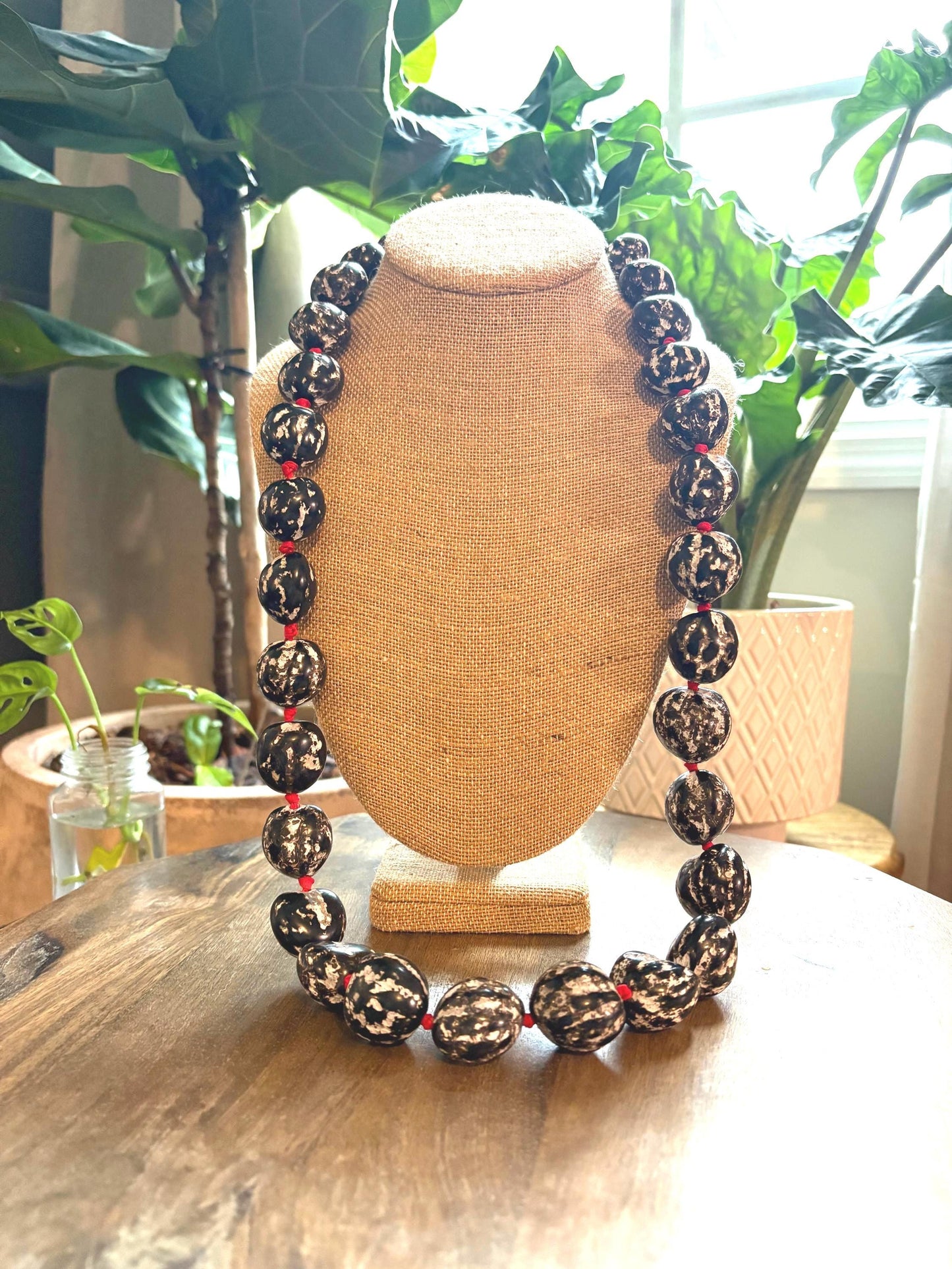 Authentic Kukui Nut Lei: 32" Black & White with Red Ribbon