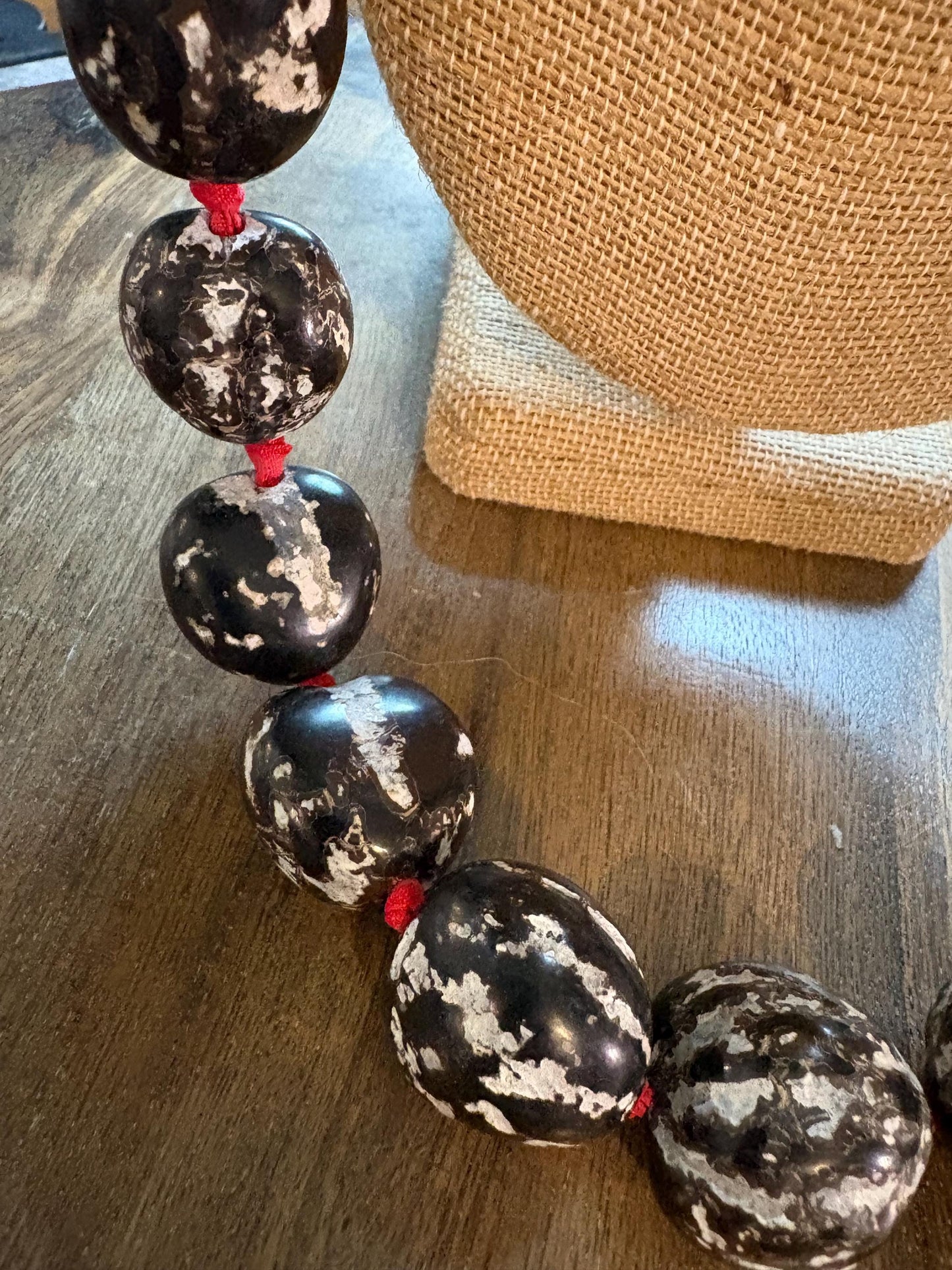 Authentic Kukui Nut Lei: 32" Black & White with Red Ribbon
