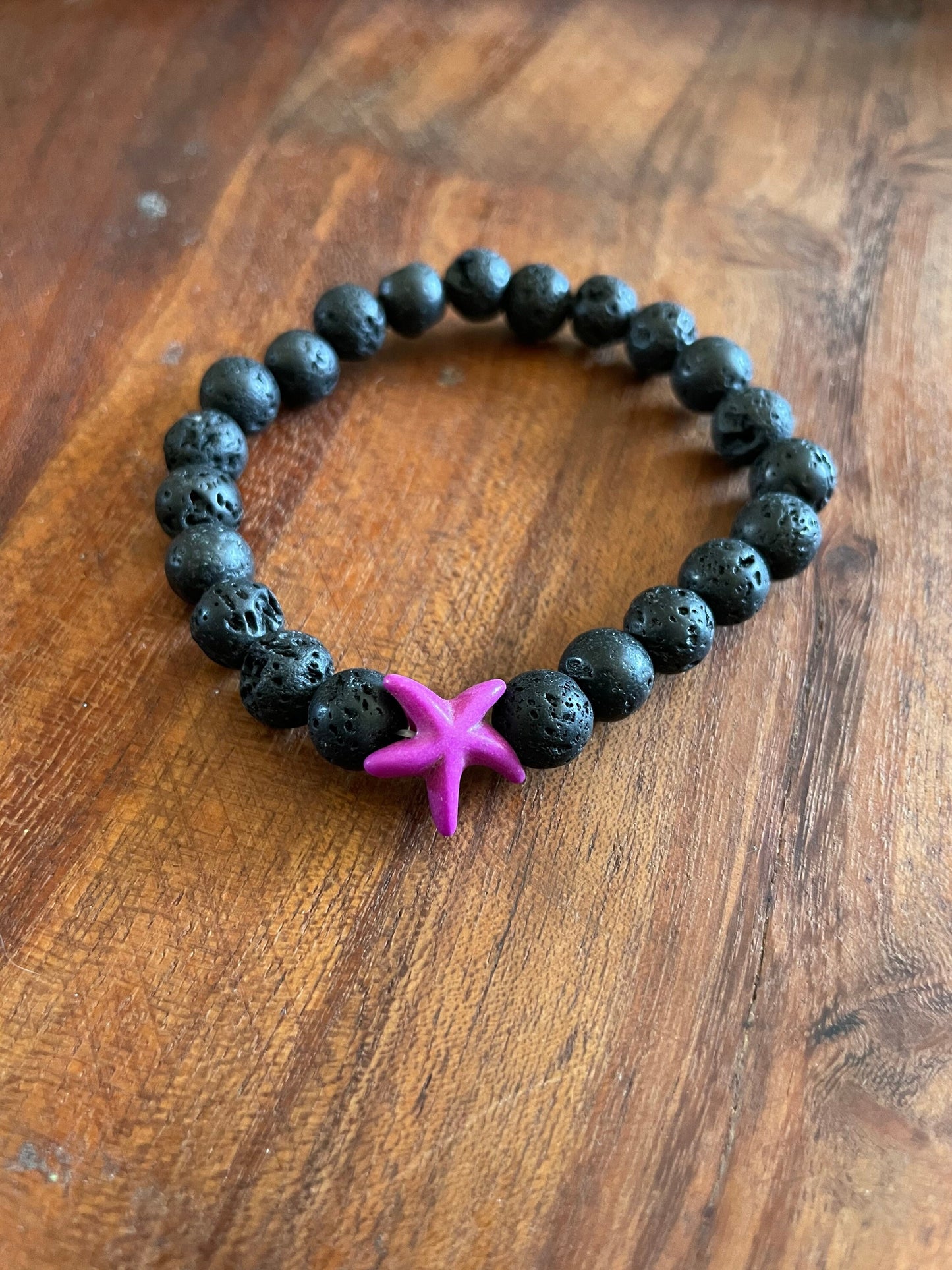Authentic Lava Beaded Elastic Bracelet with a Starfish or  iʻa hōkū Clay Accent Bead