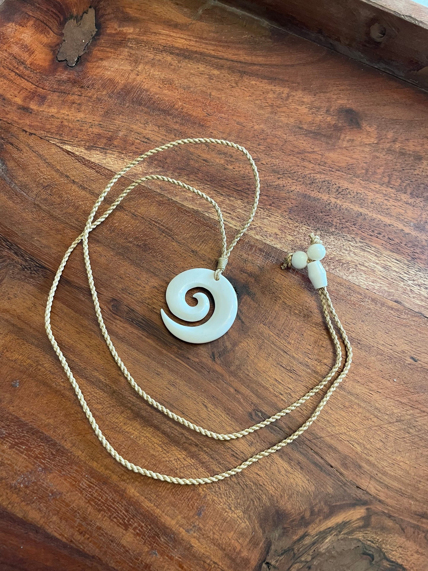 Hand Carved Buffalo Bone Koru Necklace – Māori New Zealand Fern Pendant