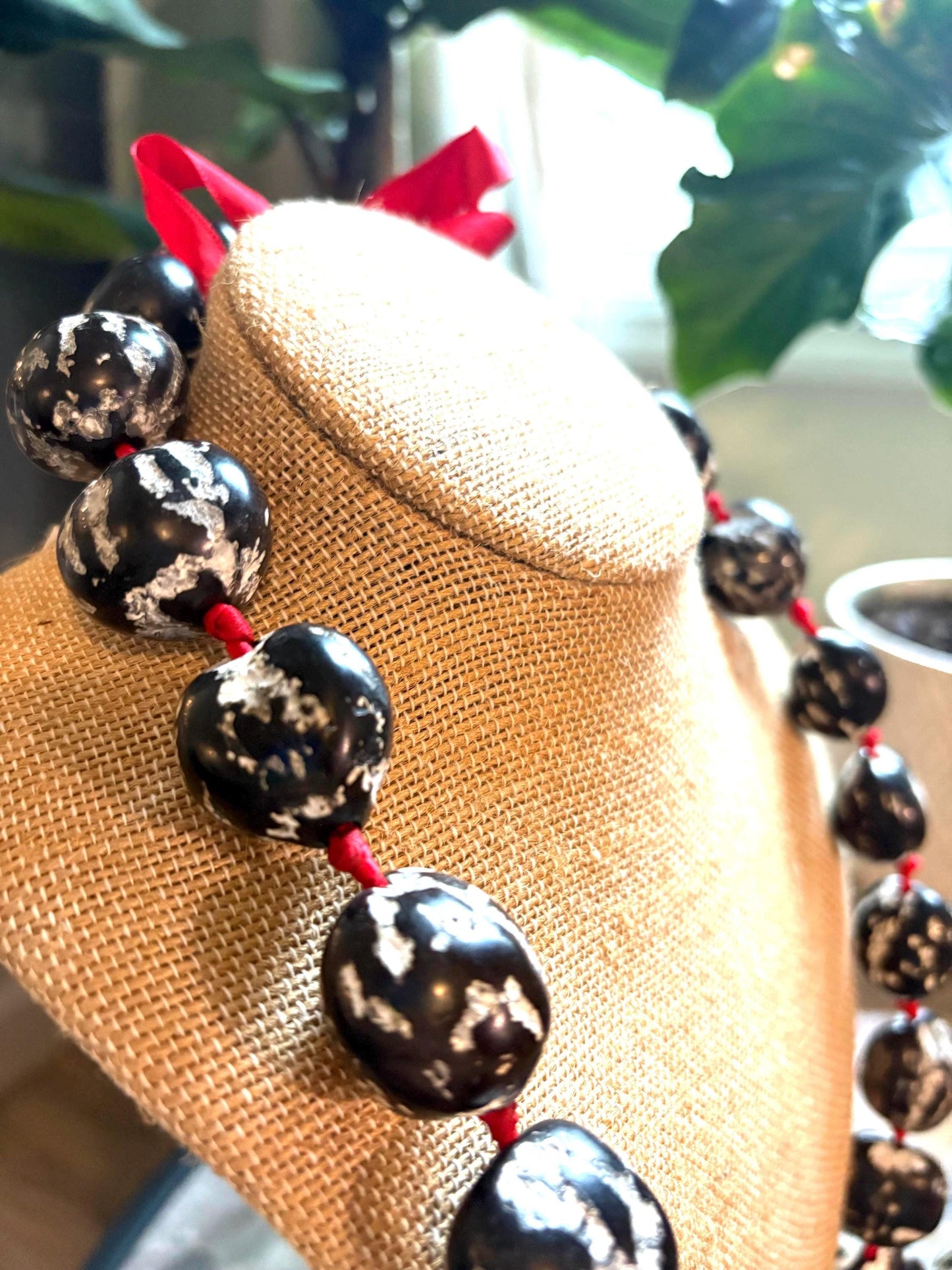 Authentic Kukui Nut Lei: 32" Black & White with Red Ribbon