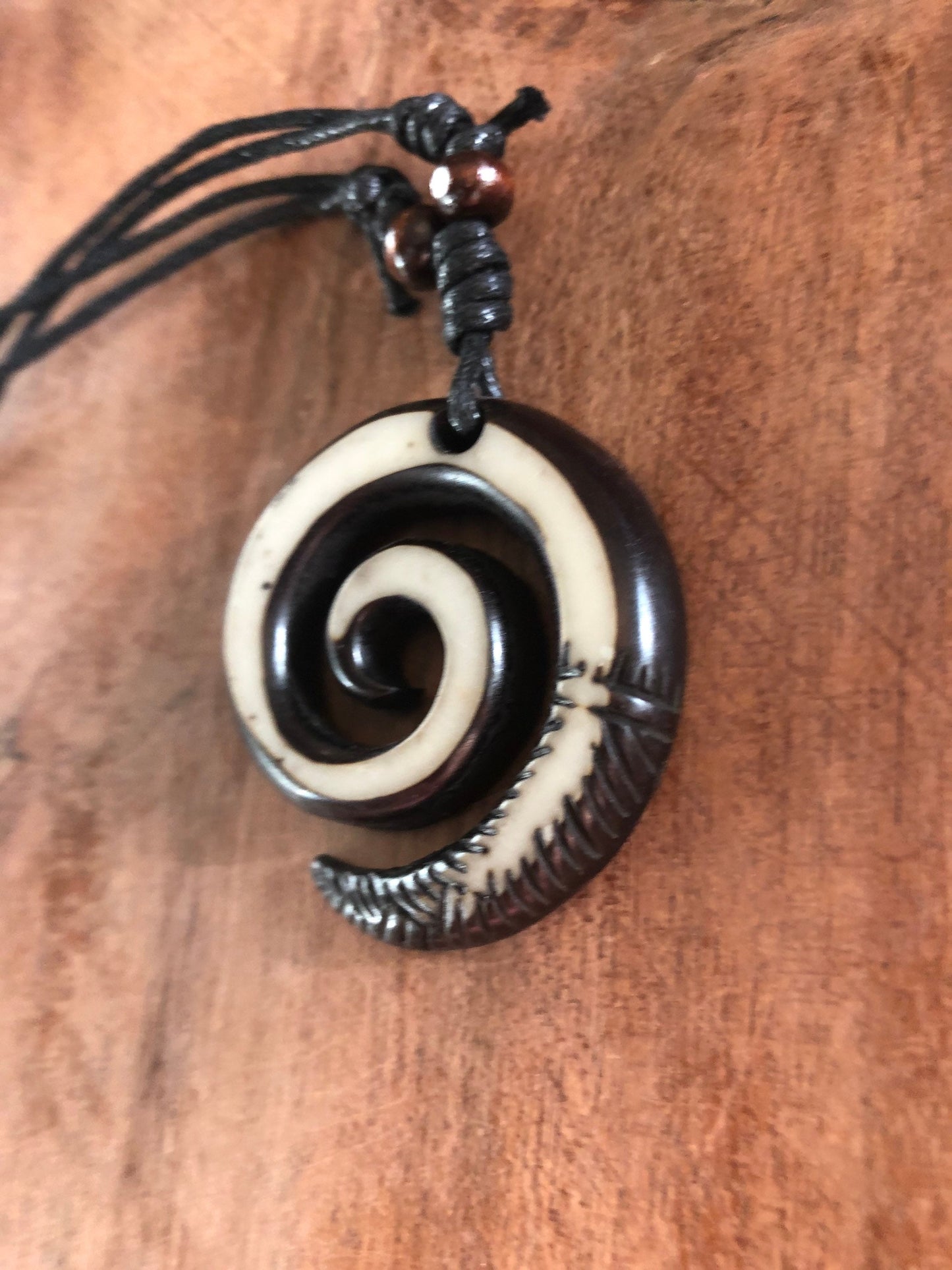 Polynesian Koru or Fern - Adjustable Surfer Pendant Necklace - Wearer Demonstrates Refusal to Give Up